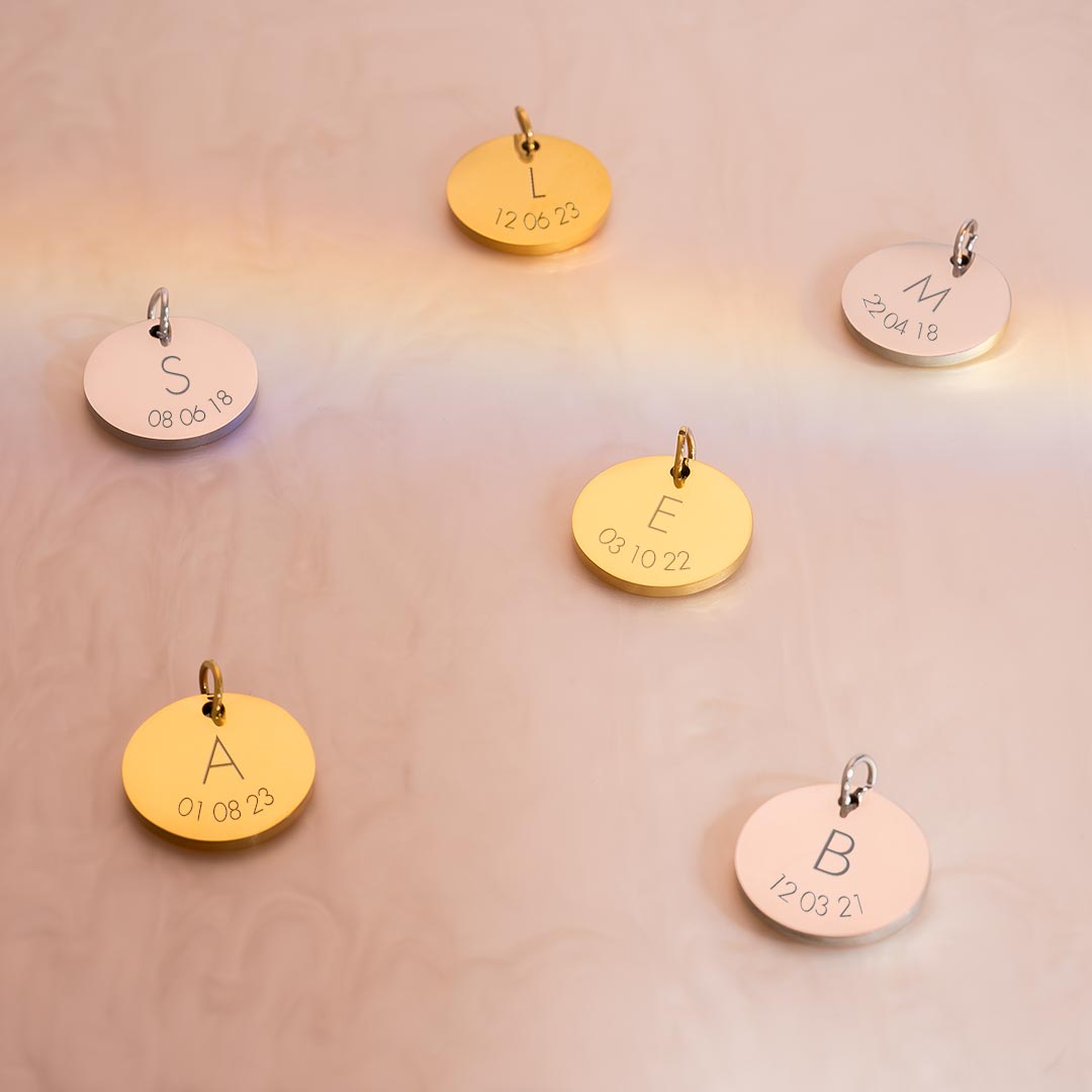 silver and gold initial and date 15 mm asta disc charms