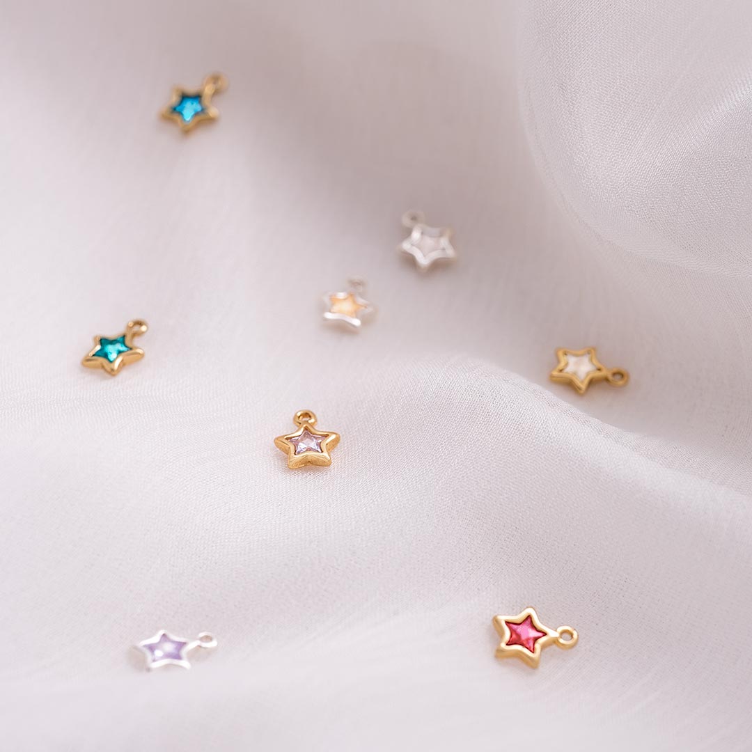silver and champagne gold plated star birthstone charms