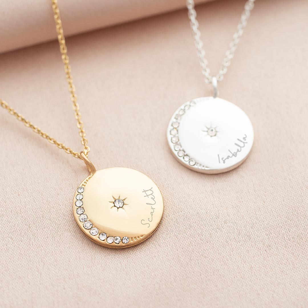 crystal moon and star disc necklace personalised with an italic script name