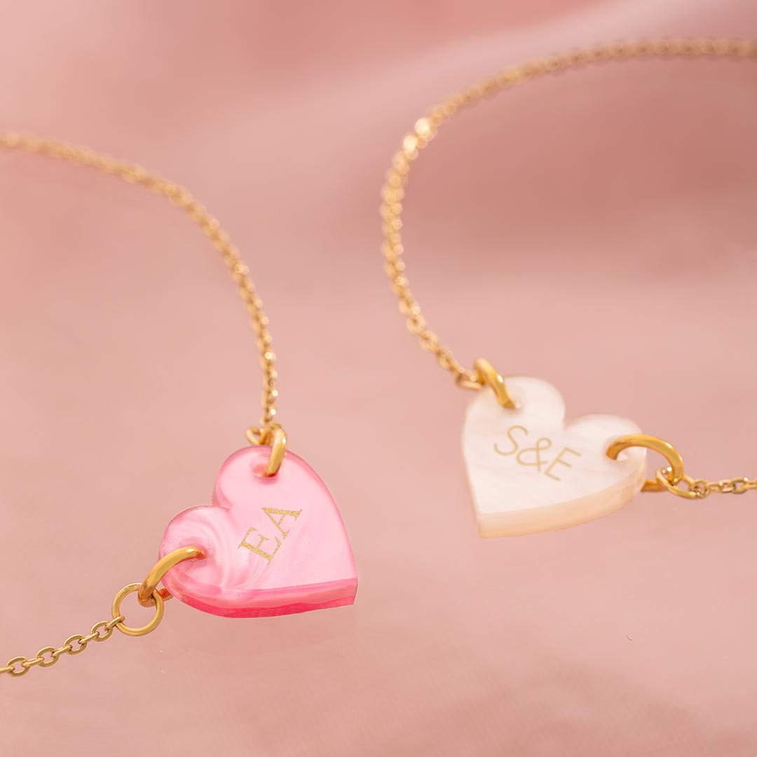 champagne gold plated acrylic heart bracelet available in pink and ivory personalised with engraved initials