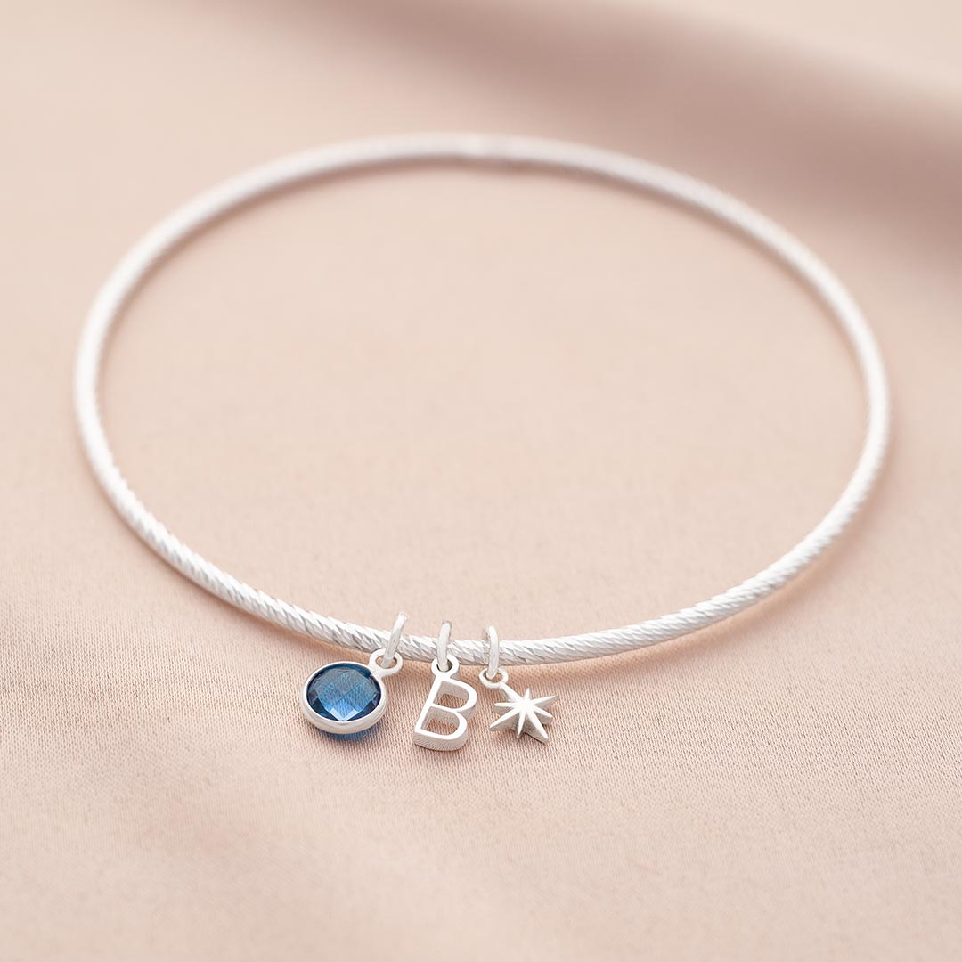 Sterling Silver Multi Charm and Birthstone Personalised Twist Bangle in Silver